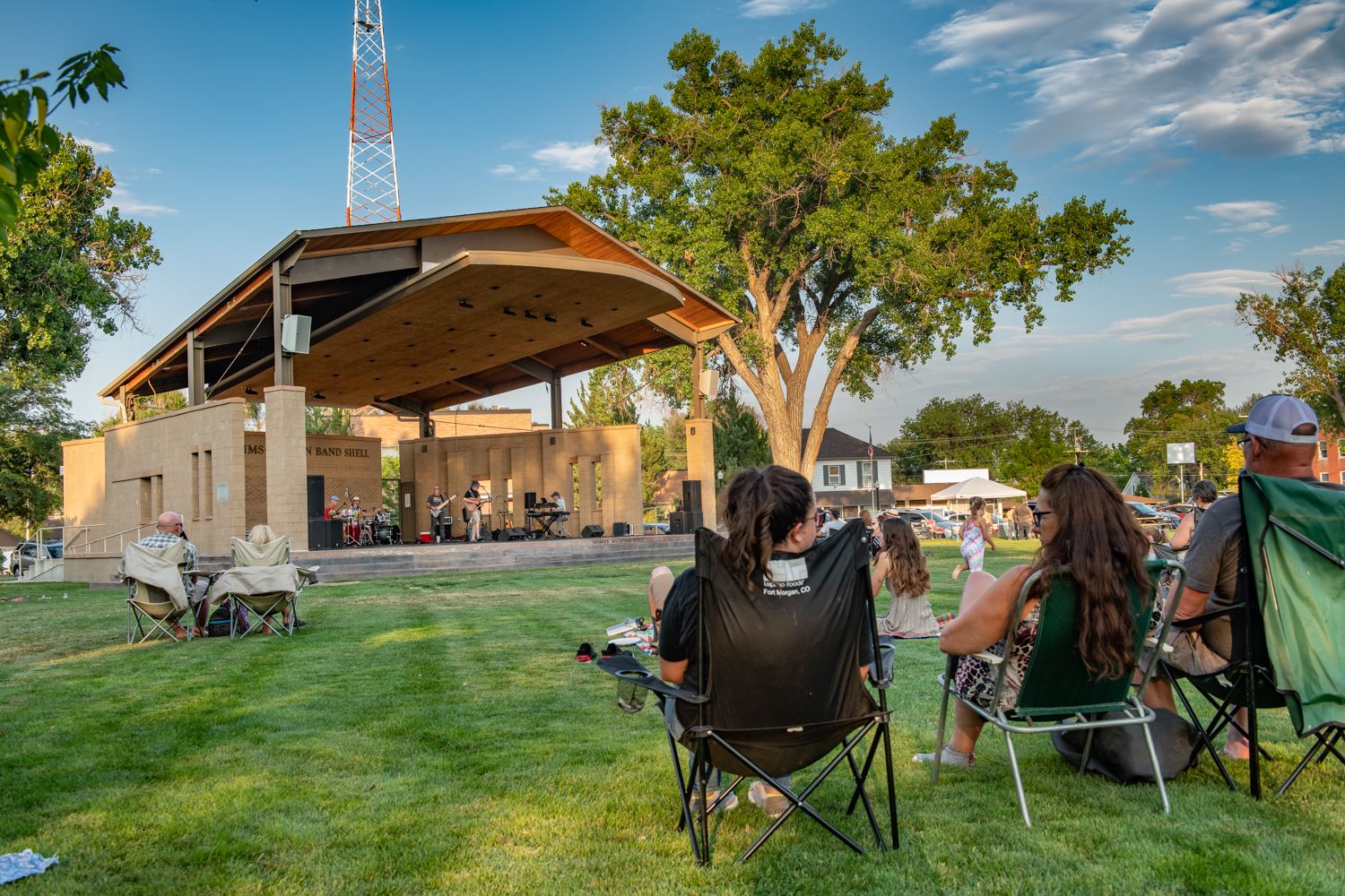 Band plays while patrons sit and listen to live music.